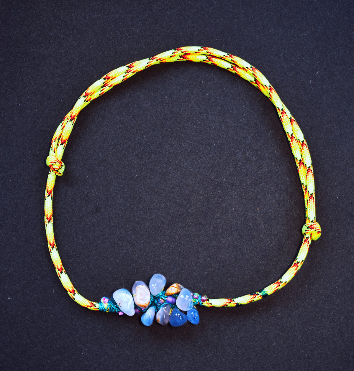 Handmade blue chalcedony necklace with clustered glass beads, teal nanocord and neon flecked paracord
