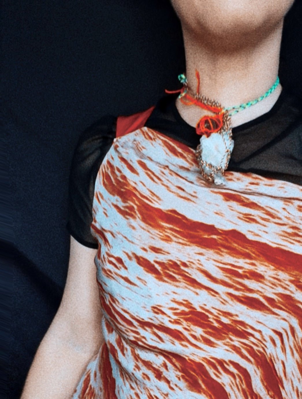 Handmade shapeshifter lariat worn with Tibetan quartz pendant and adjustable neon cord