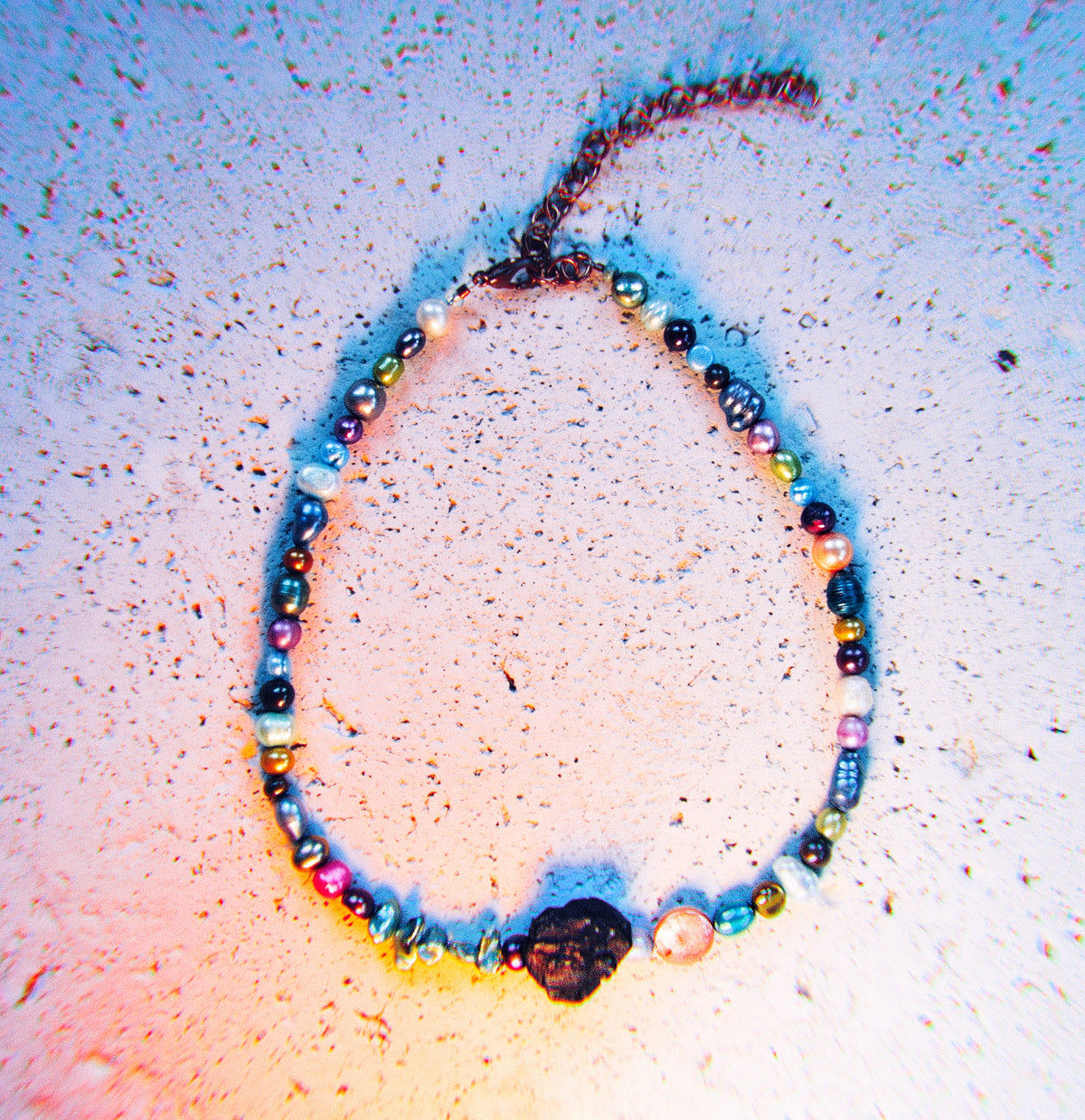 Handmade freshwater pearl choker with peach baroque pearl and rough black tourmaline centerpiece